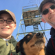 Jack Kelley, his father John Kelley, and their dog Everett at the rebuilt Goat Peak observation tower in Holyoke, MA.